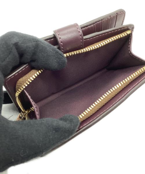 COACH（コーチ）COACH (コーチ) 2つ折り財布　シグネチャー ブラウンの古着・服飾アイテム