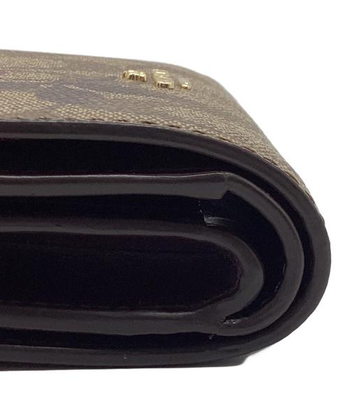 COACH（コーチ）COACH (コーチ) 2つ折り財布　シグネチャー ブラウンの古着・服飾アイテム