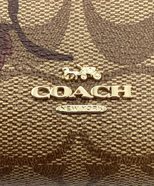 COACH（コーチ）COACH (コーチ) 2つ折り財布　シグネチャー ブラウンの古着・服飾アイテム