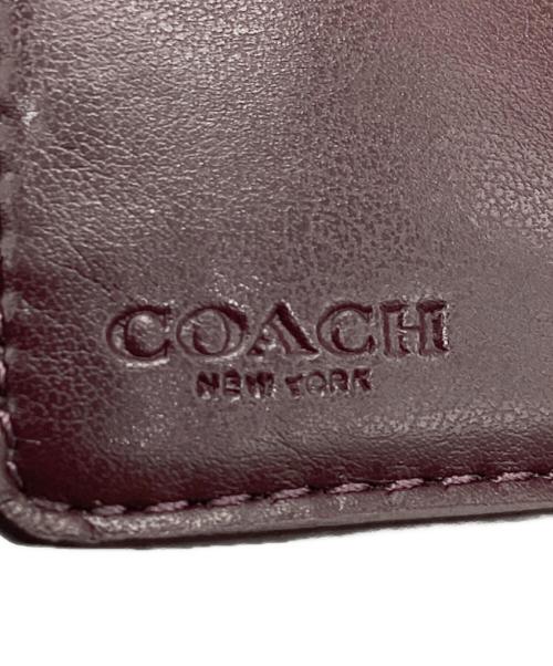 COACH（コーチ）COACH (コーチ) 2つ折り財布　シグネチャー ブラウンの古着・服飾アイテム