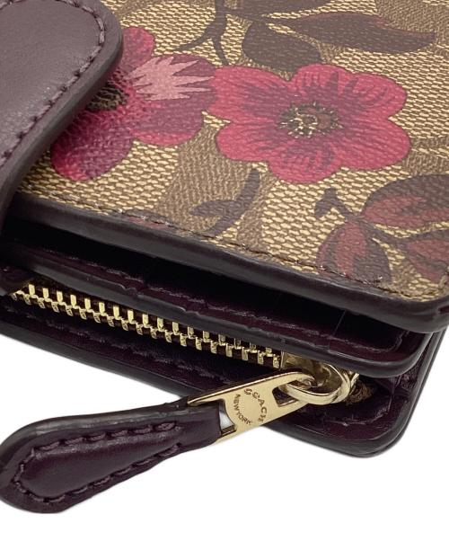 COACH（コーチ）COACH (コーチ) 2つ折り財布　シグネチャー ブラウンの古着・服飾アイテム