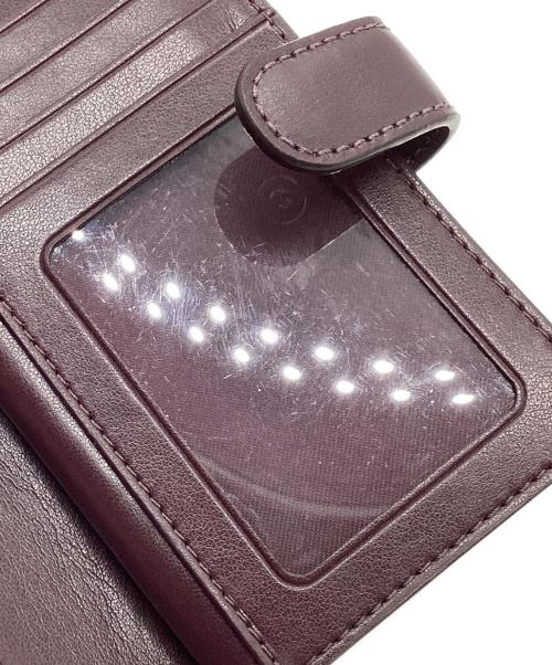 COACH（コーチ）COACH (コーチ) 2つ折り財布　シグネチャー ブラウンの古着・服飾アイテム