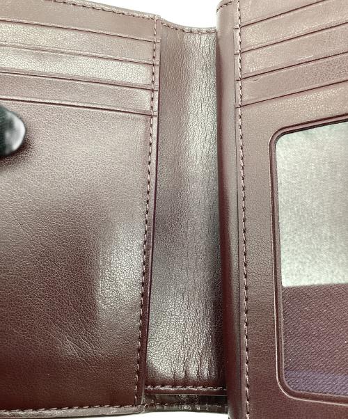 COACH（コーチ）COACH (コーチ) 2つ折り財布　シグネチャー ブラウンの古着・服飾アイテム