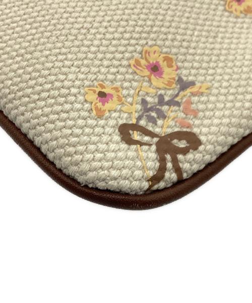 COACH（コーチ）COACH (コーチ) クラッチバッグ　ガミーベアクラッチバッグ ベージュの古着・服飾アイテム