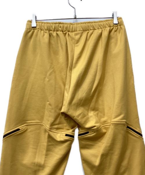 OLLY SHINDER（オリーシンダー）OLLY SHINDER (オリーシンダー) ジップディテールパンツ イエロー サイズ:Mの古着・服飾アイテム