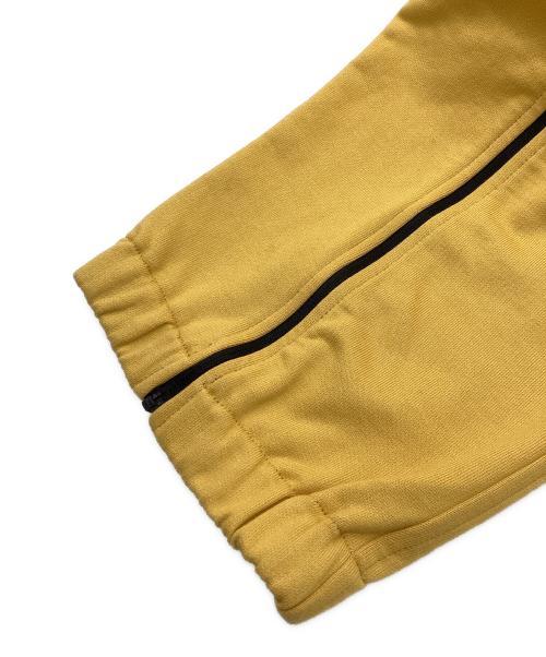 OLLY SHINDER（オリーシンダー）OLLY SHINDER (オリーシンダー) ジップディテールパンツ イエロー サイズ:Mの古着・服飾アイテム