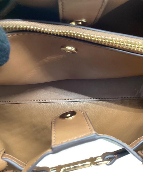 MICHAEL KORS（マイケルコース）MICHAEL KORS (マイケル・コース) CARSON センタージップ サッチェル スモール ブラウンの古着・服飾アイテム