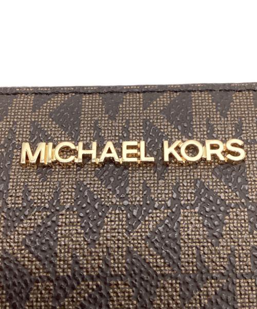 MICHAEL KORS（マイケルコース）MICHAEL KORS (マイケルコース) ラウンドファスナー財布 ブラウンの古着・服飾アイテム