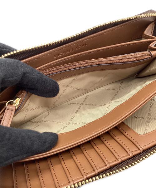 MICHAEL KORS（マイケルコース）MICHAEL KORS (マイケルコース) ラウンドファスナー財布 ブラウンの古着・服飾アイテム