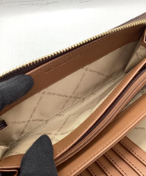 MICHAEL KORS（マイケルコース）MICHAEL KORS (マイケルコース) ラウンドファスナー財布 ブラウンの古着・服飾アイテム