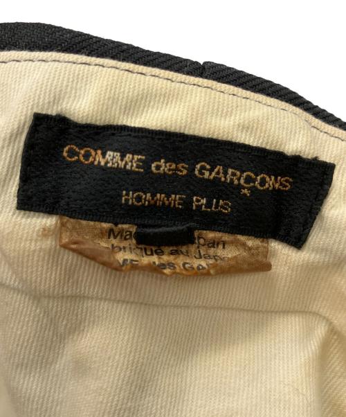 COMME des GARCONS HOMME PLUS（コムデギャルソンオムプリュス）COMME des GARCONS HOMME PLUS (コムデギャルソンオムプリュス) ポリ縮絨タックワイドテーパードパンツ ブラック サイズ:XSの古着・服飾アイテム