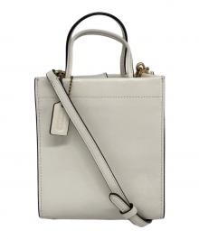 COACH（コーチ）の古着「ミニカシン」｜アイボリー