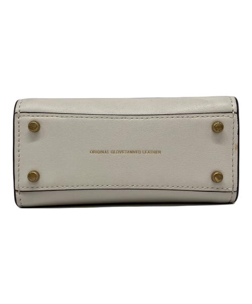 COACH（コーチ）COACH (コーチ) ミニカシン アイボリーの古着・服飾アイテム