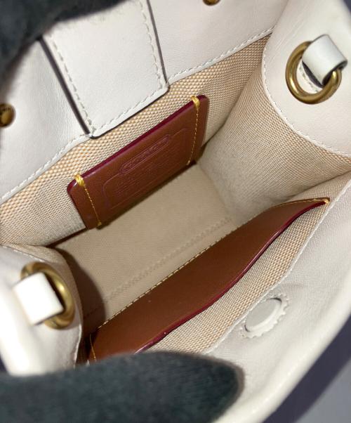 COACH（コーチ）COACH (コーチ) ミニカシン アイボリーの古着・服飾アイテム