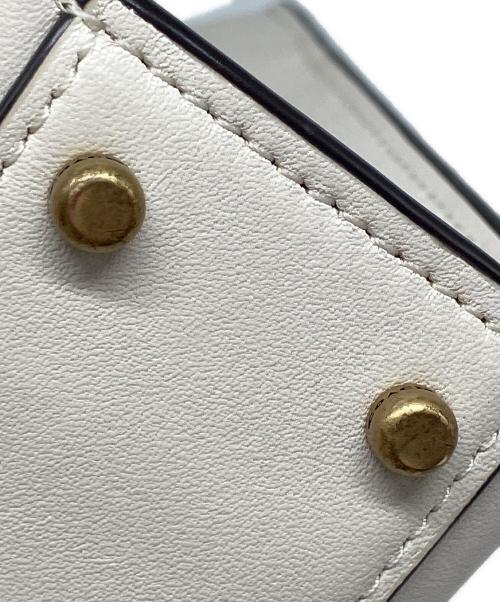 COACH（コーチ）COACH (コーチ) ミニカシン アイボリーの古着・服飾アイテム