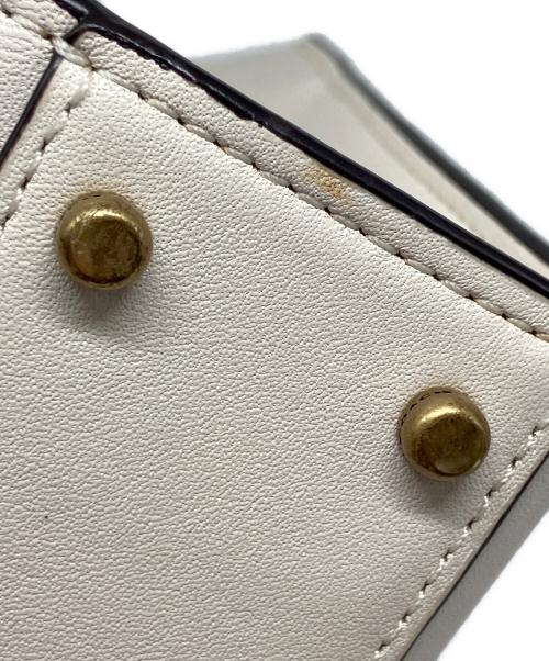 COACH（コーチ）COACH (コーチ) ミニカシン アイボリーの古着・服飾アイテム