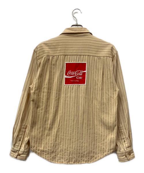 Coca Cola（コカコーラ）Coca Cola (コカコーラ) 長袖シャツ ベージュ サイズ:Lの古着・服飾アイテム