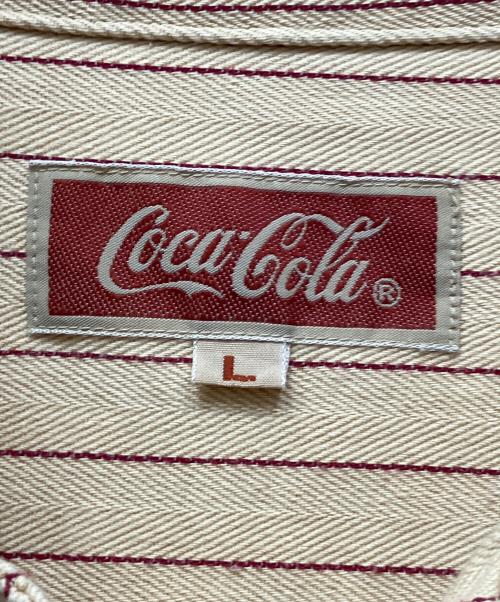Coca Cola（コカコーラ）Coca Cola (コカコーラ) 長袖シャツ ベージュ サイズ:Lの古着・服飾アイテム