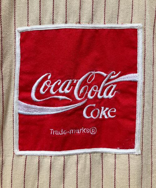 Coca Cola（コカコーラ）Coca Cola (コカコーラ) 長袖シャツ ベージュ サイズ:Lの古着・服飾アイテム