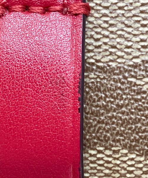 COACH（コーチ）COACH (コーチ) エンボスシグネチャー レッド×ベージュの古着・服飾アイテム