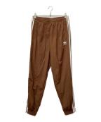 adidasアディダス）の古着「アディカラー ウーブン ファイヤーバードトラックパンツ」｜ブラウン