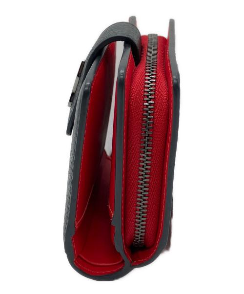 Christian Louboutin（クリスチャン・ルブタン）Christian Louboutin (クリスチャン・ルブタン) 2つ折り財布 ブラック×レッドの古着・服飾アイテム