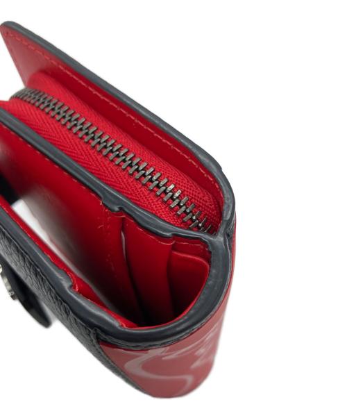Christian Louboutin（クリスチャン・ルブタン）Christian Louboutin (クリスチャン・ルブタン) 2つ折り財布 ブラック×レッドの古着・服飾アイテム