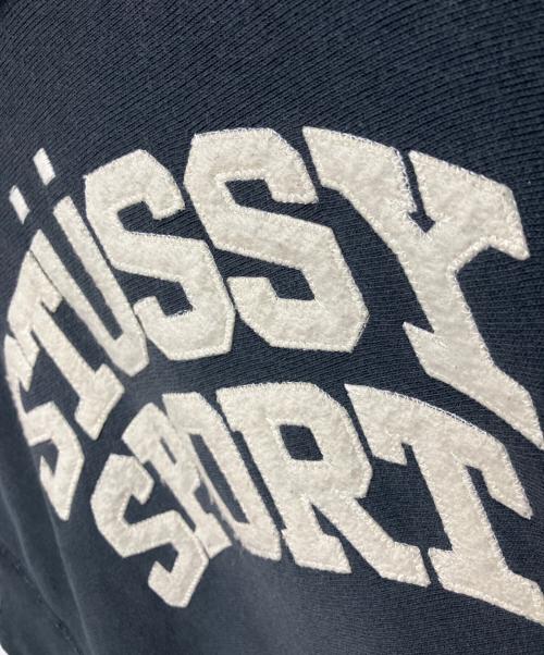 stussy（ステューシー）stussy (ステューシー) Champion (チャンピオン) リバースウィーブプルオーバーパーカー ネイビー サイズ:Lの古着・服飾アイテム