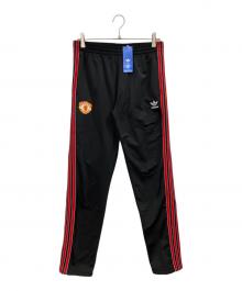 adidas（アディダス）の古着「マンチェスター・ユナイテッド '91 トラックパンツ」｜ブラック×レッド