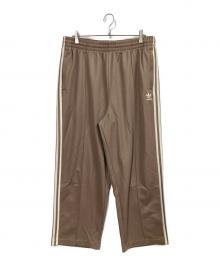 adidas（アディダス）の古着「アディカラー バギーフィット ファイヤーバードトラックパンツ」｜ブラウン