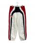 SUPREME（シュプリーム）の古着「UNBRO TRACK PANT / トラックパンツ」｜ホワイト×レッド