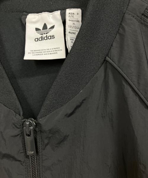 adidas（アディダス）adidas (アディダス) Adilenium シーズン 3 オーバーサイズ SST トラックトップ ジャケット ブラック サイズ:2XLの古着・服飾アイテム