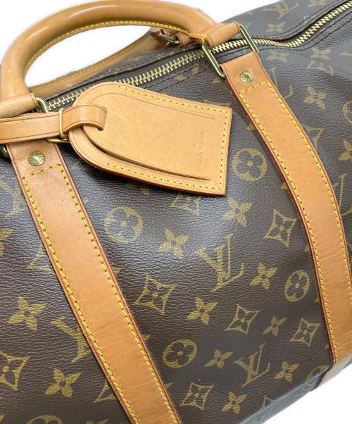 LOUIS VUITTON（ルイ ヴィトン）LOUIS VUITTON (ルイ ヴィトン) キーポル・バンドリエール55 / ボストンバッグ ブラウンの古着・服飾アイテム
