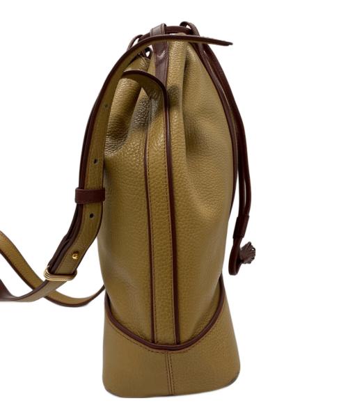 Cartier（カルティエ）Cartier (カルティエ) 巾着ショルダーバッグ ブラウン×レッドの古着・服飾アイテム