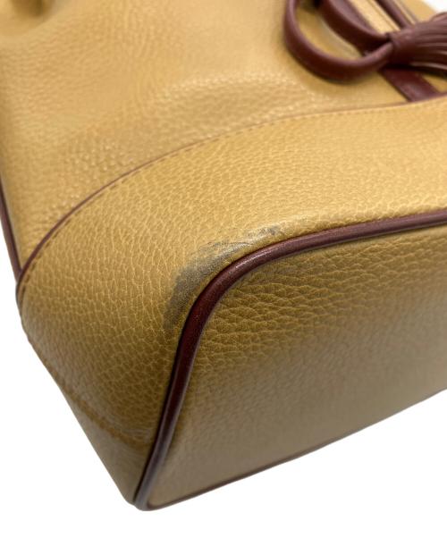 Cartier（カルティエ）Cartier (カルティエ) 巾着ショルダーバッグ ブラウン×レッドの古着・服飾アイテム