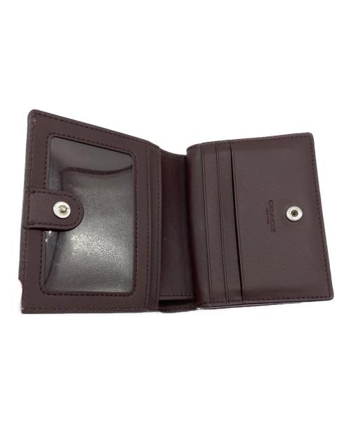 COACH（コーチ）COACH (コーチ) 2つ折り財布 パープルの古着・服飾アイテム