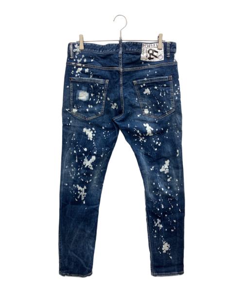 DSQUARED2（ディースクエアード）DSQUARED2 (ディースクエアード) ペイント加工・バックロゴパッチ・フロントロゴタグ付きスプラッシュクラッシュデニム インディゴ サイズ:52の古着・服飾アイテム