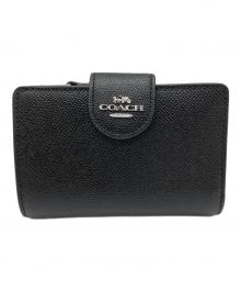 COACH（コーチ）の古着「2つ折り財布」｜ブラック