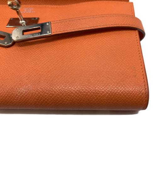 HERMES（エルメス）HERMES (エルメス) 長財布 オレンジの古着・服飾アイテム