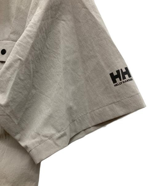 HELLY HANSEN（ヘリーハンセン）HELLY HANSEN (ヘリーハンセン) 半袖シャツ ベージュ サイズ:Lの古着・服飾アイテム