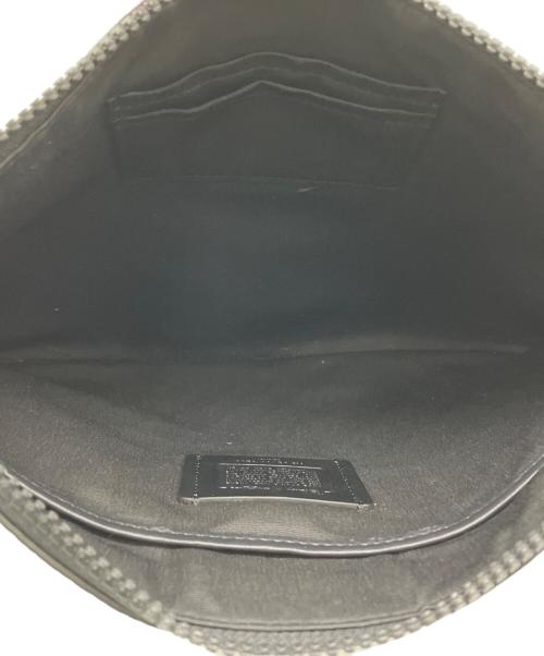 COACH（コーチ）COACH (コーチ) Disney (ディズニー) クラッチバッグ グリーンの古着・服飾アイテム