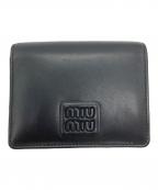 MIU MIUミュウミュウ）の古着「ソフティパデッド 折りたたみ財布」｜ブラック