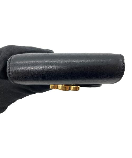 CELINE（セリーヌ）CELINE (セリーヌ) トリオンフ スモール フラップウォレット ブラックの古着・服飾アイテム