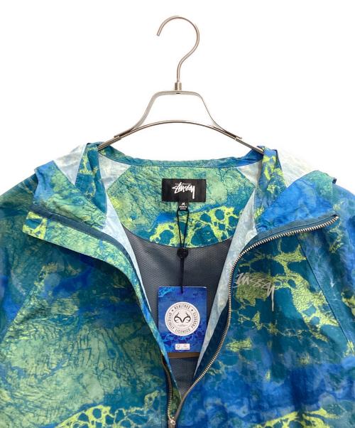 stussy（ステューシー）stussy (ステューシー) beach shell Realtree WAV3 ブルー×グリーン サイズ:Mの古着・服飾アイテム