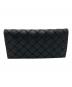 BOTTEGA VENETA（ボッテガベネタ）の古着「二つ折り札入れ」｜ブラック