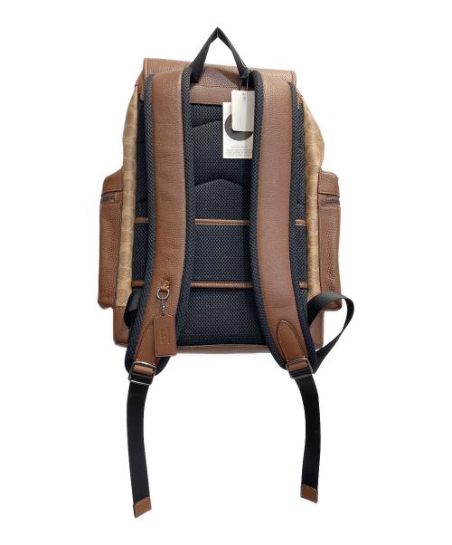 COACH（コーチ）COACH (コーチ) PEANUTS (ピーナッツ) プリント バックパック ブラウンの古着・服飾アイテム