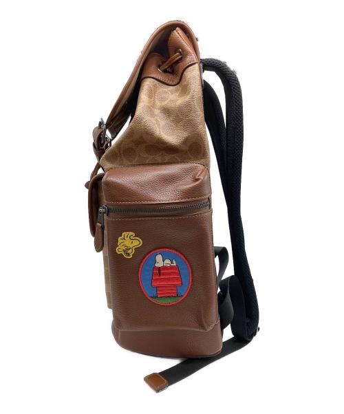 COACH（コーチ）COACH (コーチ) PEANUTS (ピーナッツ) プリント バックパック ブラウンの古着・服飾アイテム