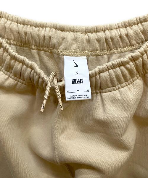NIKE（ナイキ）NIKE (ナイキ) BLLIE EILISH スウェットパンツ ベージュ サイズ:Lの古着・服飾アイテム