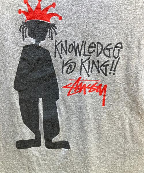 stussy（ステューシー）stussy (ステューシー) knowledge is king シャドーマン Tシャツ グレー サイズ:XLの古着・服飾アイテム
