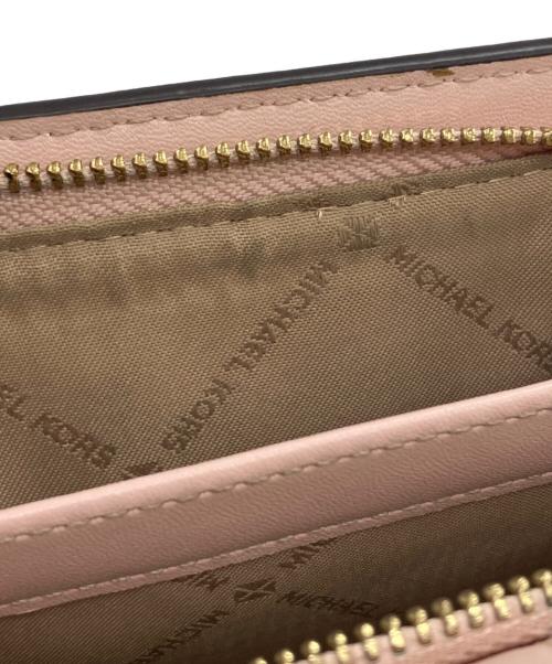 MICHAEL KORS（マイケルコース）MICHAEL KORS (マイケルコース) 2つ折り財布 ピンクの古着・服飾アイテム